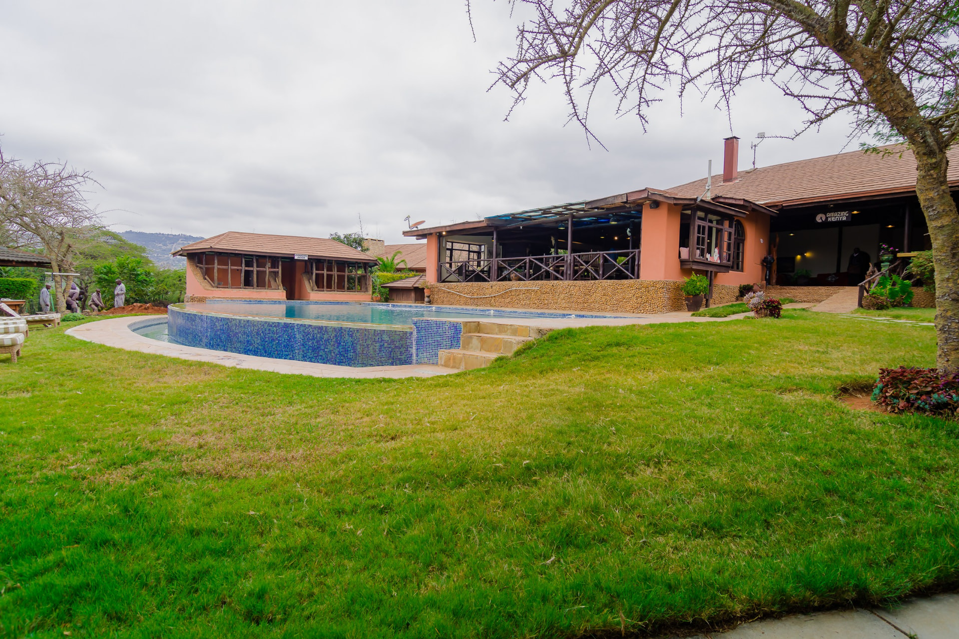 Swimming pool and lawns with the hills beyond