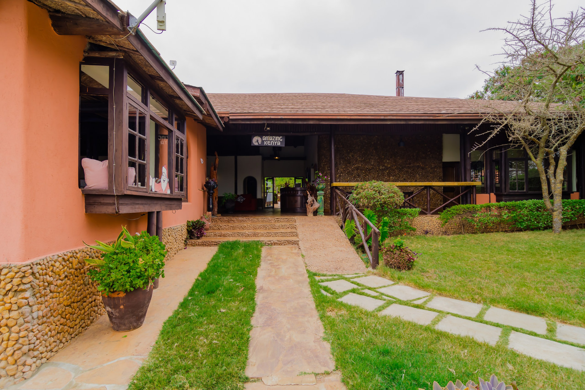 Lodge entrance and landscaped garden walkway