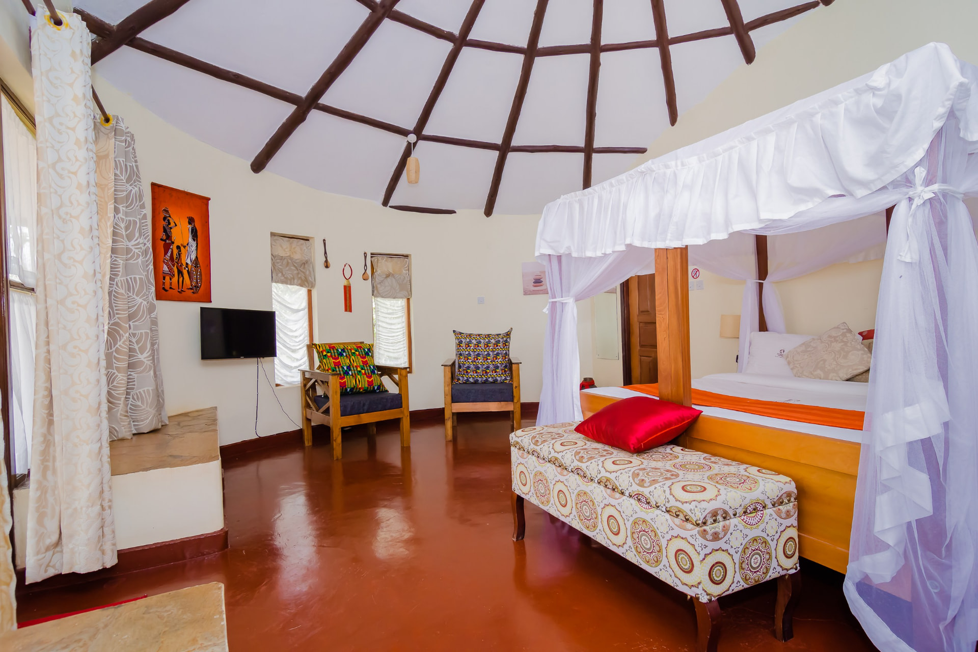 Bedroom with safari chairs and woven décor