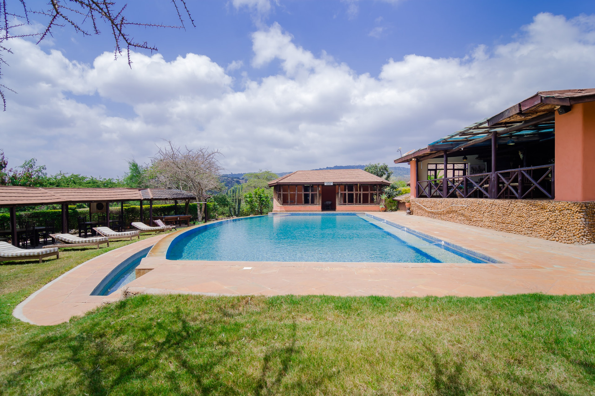 Poolside view of the main lodge building
